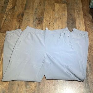 RBX Running Pants.  2 side zipper pockets.  Partial elastic waste. Elastic leg